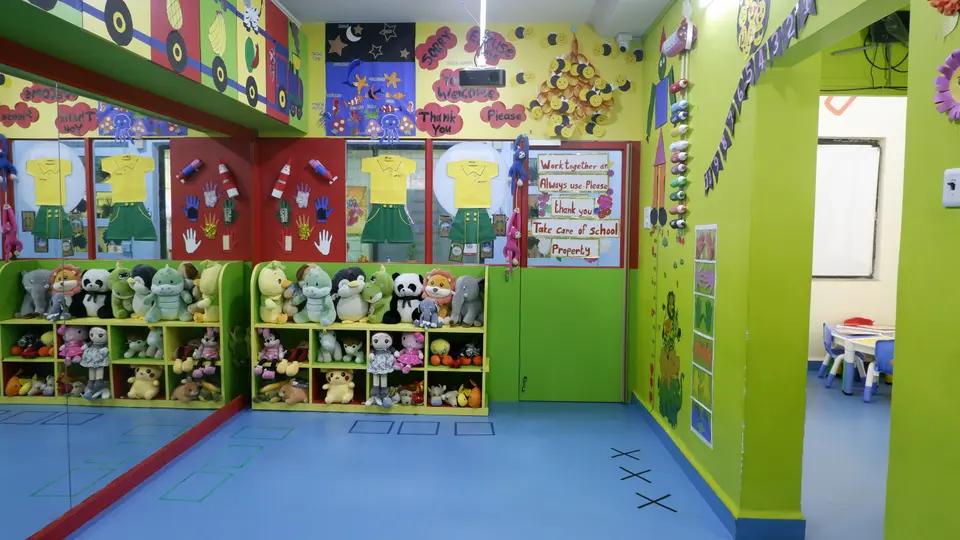 Activity hall with a soft-toy library and mirror wall